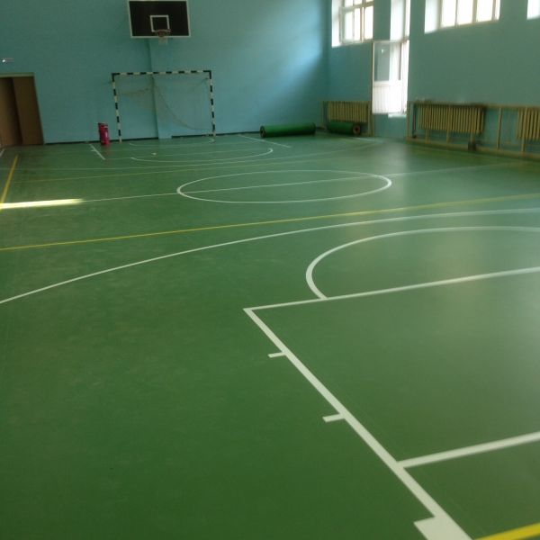 Установка спортивного покрытия LG Hausys floors с разметкой в школе